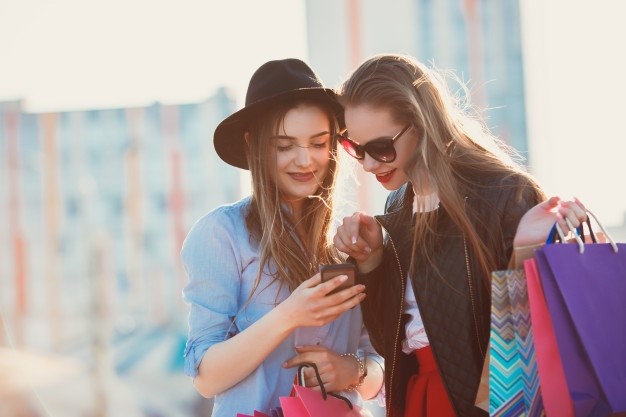 two girls shopping