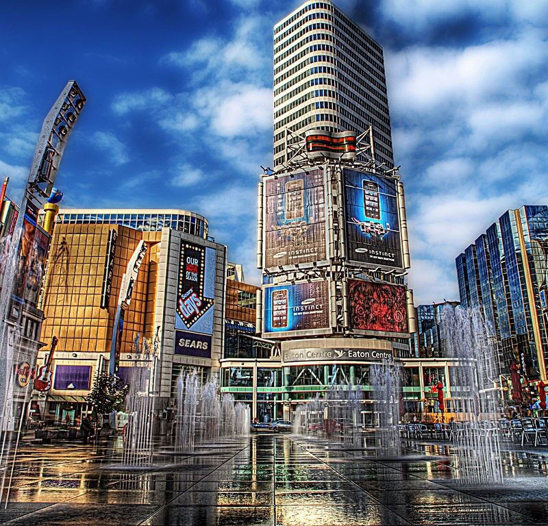 Buildings with LED digital billboards and digital signage, representing their popularity among businesses