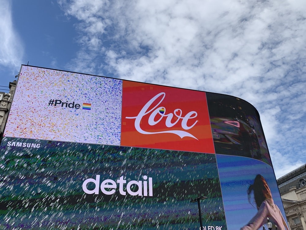 Digital display screens on buildings advertising popular brands