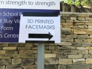 Traditional sign giving directions to 3D printed masks